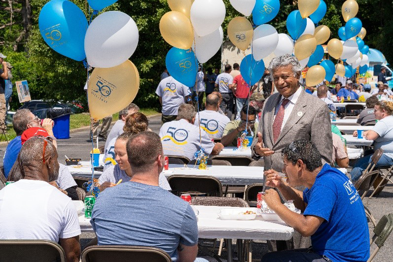 Roanoke employees enjoying a meal together.