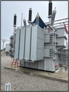 Secondary energy transformer on concrete pad.